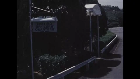 HONOLULU - 1978: Post theater - A carved eagle sits above lettering Stock Footage 343936784