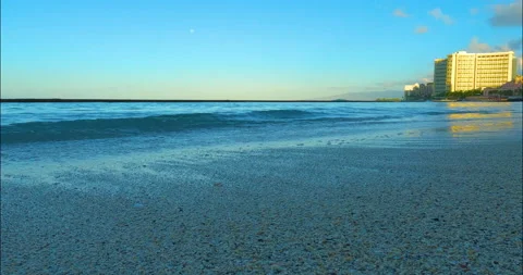 Honolulu beach with quite small waves. Hotel on Waikiki Beach in Oahu.  Stock Footage 202754260
