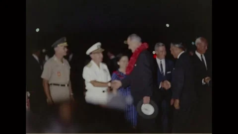 HONOLULU, HAWAII - 1966: Lei presentation greeting - Guest receives a flower lei Stock Footage 344005026