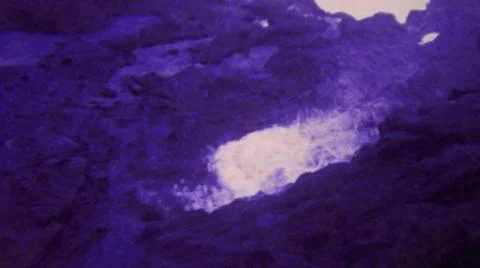 HONOLULU HAWAII USA-1964: Exploding Blue Water Geyser Rock Volcano Flowing Stock Photos