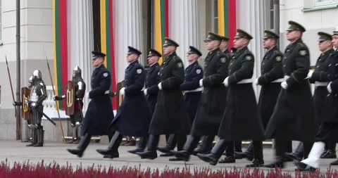 Honor guard marching to flag-raising at Vilnius Presidential Palace Stock Footage 321050218
