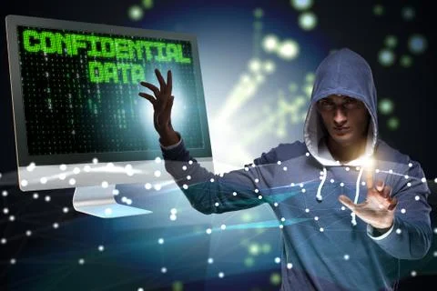 Hooded hacker in data computer security concept Foto stock