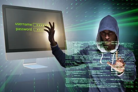 Hooded hacker in data computer security concept Foto stock