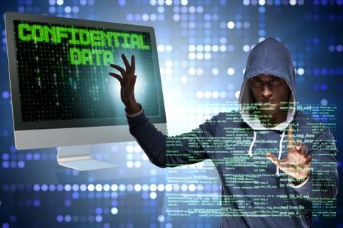 Hooded hacker in data computer security concept Foto stock