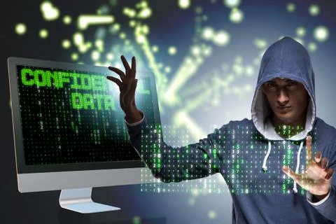 Hooded hacker in data computer security concept Foto stock
