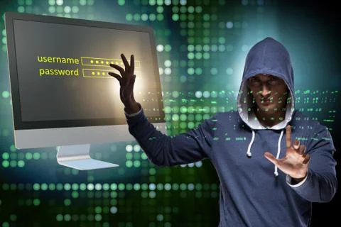 Hooded hacker in data computer security concept Foto stock