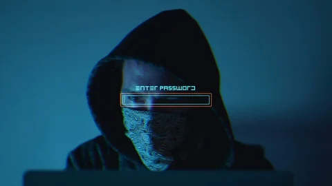 Hooded Hacker with HUD overlay Breaks into Data Server and looks around 動画素材 127694230