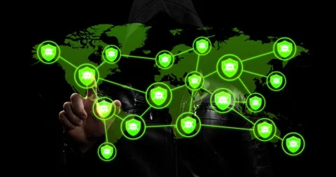 Hooded hacker in the shadows touching a digital green world map Vídeos de archivo 337428783