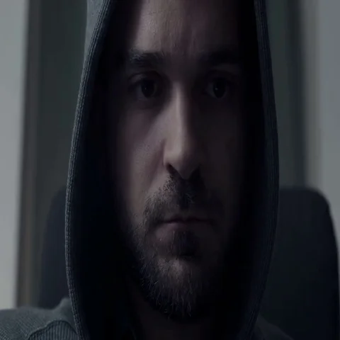 Hooded hacker while working at the computer Stock Footage 69518627