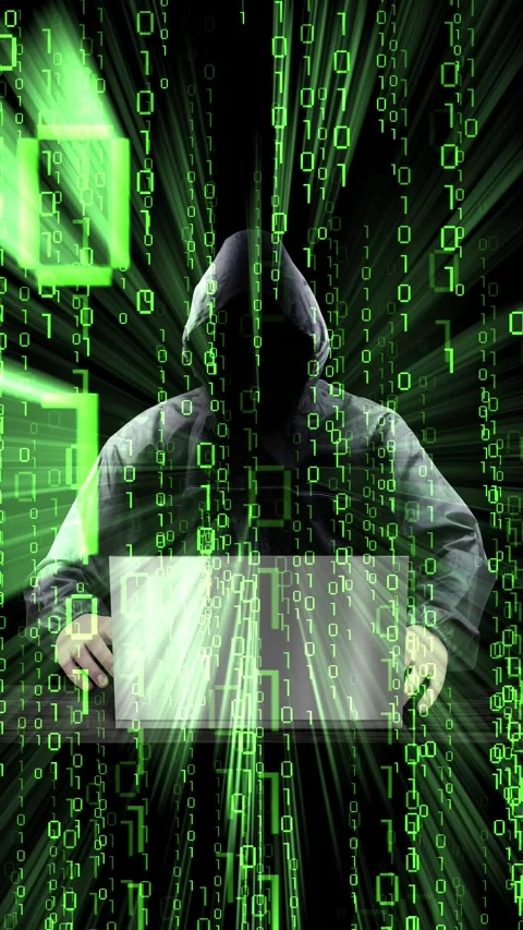 Hooded hacker working on computer Stock Footage 314076328