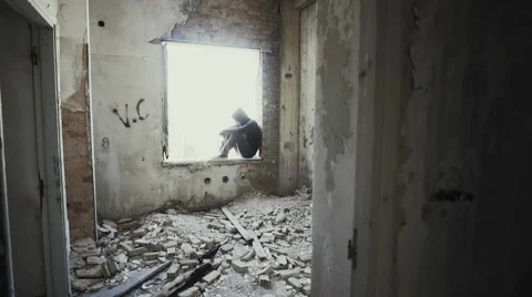 Hooded young man inside destroyed abandoned building,slow motion,dramatic Vídeos de archivo 67255620