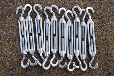 Hook and loop, bolt for fastening and pulling various objects, Roman screw Stock Photos