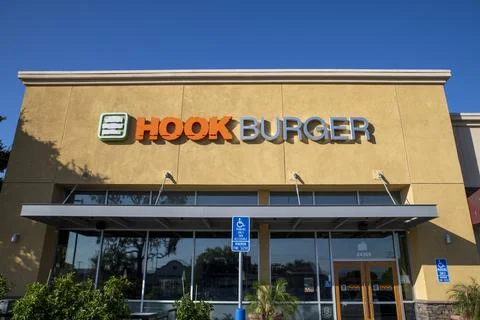 Hook Burger restaurant cafe modern exterior storefront entrance logo sign Stock Photos