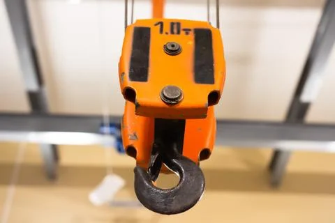 Hook of crane working at warehouse Stock Photos