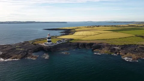 Hook Lighthouse drone panorama with Hook Peninsula, coastal Co. Wexford, Ireland Stock Footage 340257033