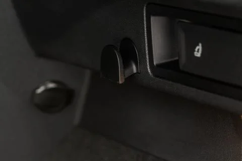 A hook for packages in the trunk of the car. Modern car trunk. Stock Photos