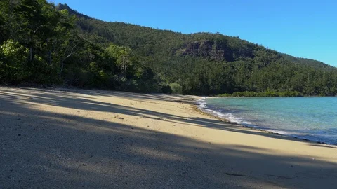 Hook Passage beach with a distant dinghy 스톡 동영상 116298920