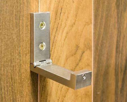 The hook for things is fixed on the wall. Stock Photos