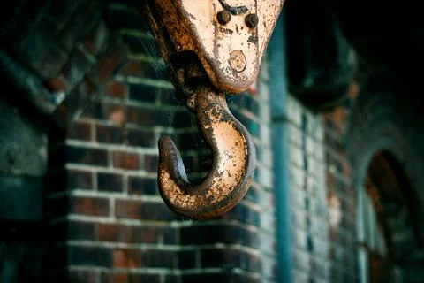 The hook from the winch hangs on the iron ropes Stock Photos