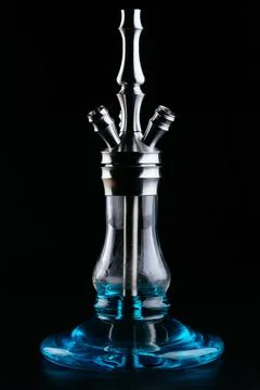 Hookah on a black background with smoke Stock Photos