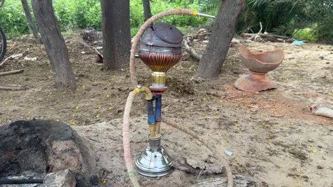 Hookah Outdoors, Rustic Scene with Traditional Hookah Pipe Stock Footage 320354798