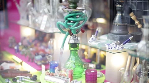 Hookah, pipes displayed in shop window Stock Footage 63293041