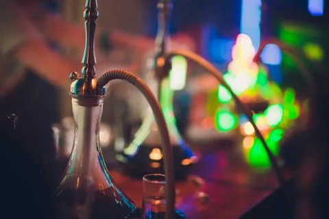 Hookah in the restaurant hookah elements on the background of a blurry interior Stock Photos