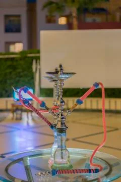 Hookah in the restaurant, hookah elements on the background of a blurry inter Stock Photos