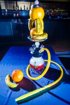 Hookah with a round transparent flask in which there is a red liquid. Hookah Stock Photos
