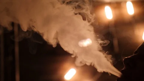 Hookah smoke in darkness. Warm light as a background 스톡 동영상 116777412