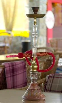 Hookah on a table at a cafe for guests Stock Photos