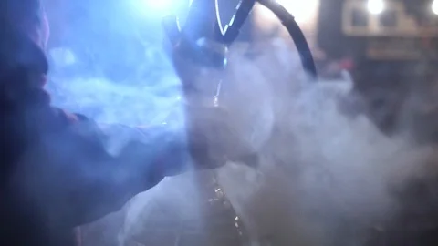 Hookahman makes a hookah in a hookah cafe Stock Footage 88531926