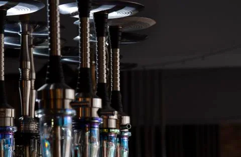 Hookahs on the table on a dark background.copyspace for text. selective focus Stock Photos