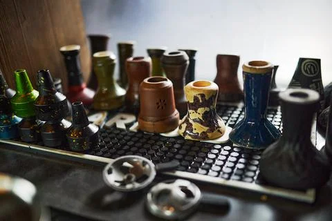 Hookans in front of the wall in bar Stock Photos