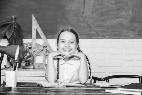 Hooked on learning. Small kid study school. Knowledge day. Accelerating into Stock Photos