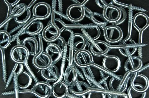 Hooked screw rings on a dark background. High quality photo Stock Photos