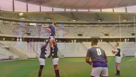 Hooker throwing rugby ball for lineout drill lifters lifting jumper and player9 Stock Footage 310459707