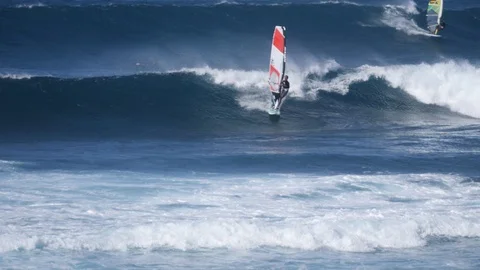 Hookipa Surf Windsurf Pro ripping waves 4k 60p slo-mo Stock Footage 109397365