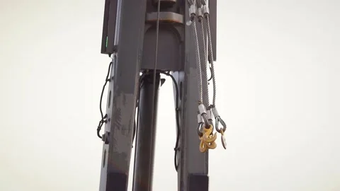Hooks are fixed on crane fastenings Stock Footage 142498124
