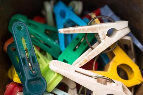 Hooks for drying wet clothes. Various colors close up. High quality photo. Stock Photos