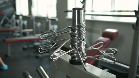 Hooks for exercise machines. Modern gym Stock Footage 136814962