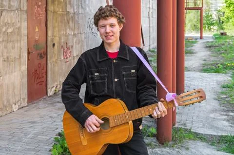Hooligan with guitar Stock Photos