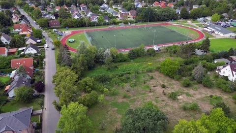 Hooligans of the black bloc at the soccer match. Magic aerial view flight berlin Stock Footage 220156165
