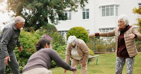 Hoop, exercise and senior people outdoor for wellness, playful fitness and warm Stock Footage 341101541