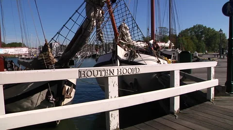 Hoorn wooden boat jetty near the harbor Stock Footage
