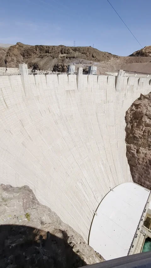 Hoover Dam sweeping panoramic view. Right to left horizontal pan. Stock Footage 328407140