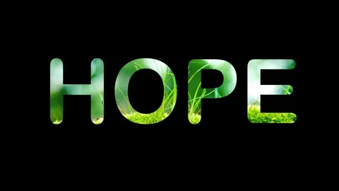 Hope text with grass on black background Stock Footage 116178242