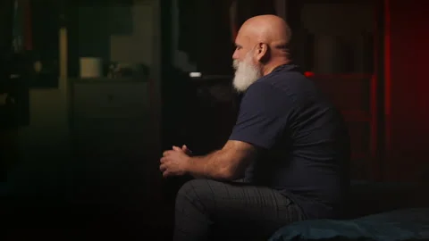 Hopeless middle-aged man thinks about divorce at home, feeling depressed Stock Footage 346714348