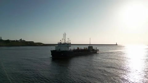 Hopper dredger UKD Marlin entering the River Tyne Stock Footage 313522896