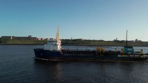 Hopper dredger UKD Marlin entering the River Tyne Stock Footage 313522917